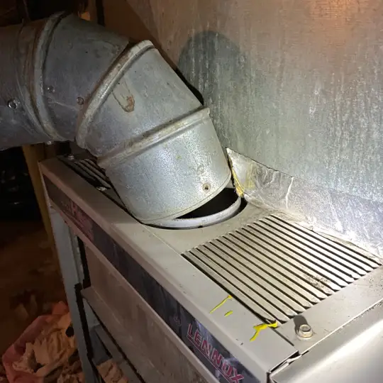 Rusted and disconnected furnace ventilation pipe in Cuyahoga County. The occupants were unaware that they were being exposed to high levels of carbon monoxide.
